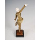 An early 20th century Art Deco bronze and ivory figure group of a ballets russe dancer, modelled
