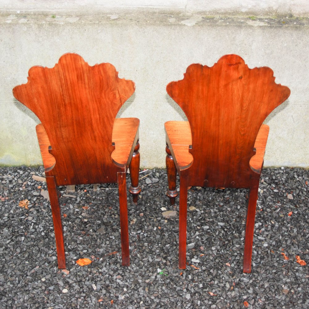 A pair of 19th century mahogany fan back hall chairs, the fan shaped backs carved with floral - Image 7 of 7