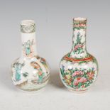 A Chinese porcelain famille verte bottle vase, Qing Dynasty, decorated with female dancing on a