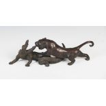 A Japanese bronze figure group of tiger and crocodile, Meiji Period, signed, 38cm wide x 11.5cm