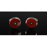 ORLAP STUDIO, A pair of silver circular cufflinks, each set with carnelian, onyx and a single