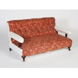 A late 19th century mahogany sofa, Howard & Sons, London, the button down upholstered back and stuff