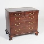 A George III Laburnum chest, the rectangular top with a moulded edge above two short and three