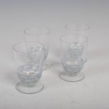 Rene Lalique, 'Pouilly', a set of four clear and blue stained liqueur glasses, etched mark 'R.