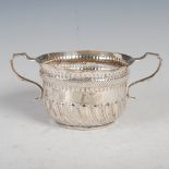 A Victorian silver loving cup, London 1881, maker mark of JSB, the tapered cylindrical body with