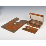 A 19th century walnut artists 'en plein air' paint box and oak palette, the artists box opening to a