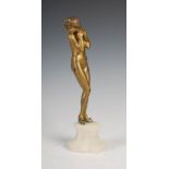 Claire Colinet (1880-1950) - An early 20th century gilt bronze figure of a nude, modelled standing