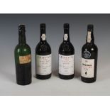 Four bottles of assorted vintage Port, comprising: two bottles of Graham's 1985 Vintage Port bottled