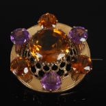 A late 19th century yellow metal, amethyst and citrine set Scottish plaid brooch, centred with a