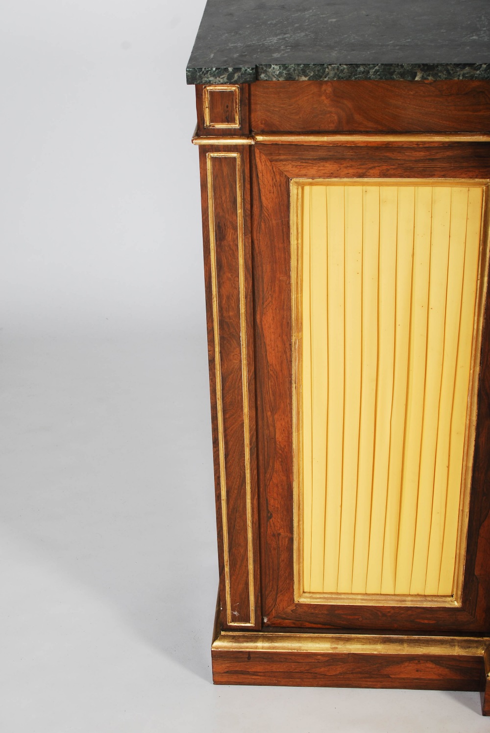 A 19th century Regency style rosewood and parcel gilt breakfront side cabinet, the mottled green and - Image 9 of 12