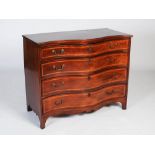 A George III mahogany, boxwood and ebony lined serpentine chest, the shaped rectangular top over