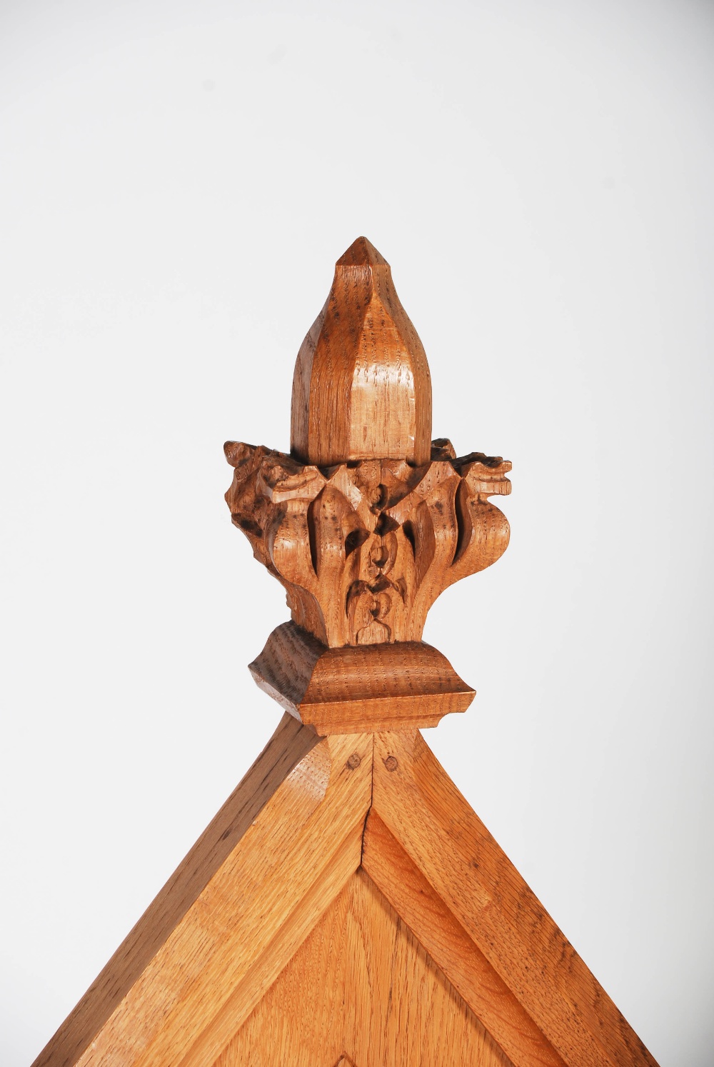 An early 20th century oak Gothic altar chair, the triangular panelled back centred with a relief - Image 5 of 9