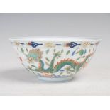 A Chinese porcelain Wucai dragon bowl, bearing Jiaquing seal mark but probably later, the interior