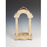 A 19th century prisoner of war carved wood and bone decorated four pillar arch, with bagpipes and