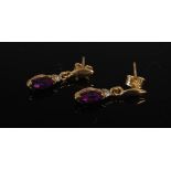 A pair of 9 carat yellow gold, faceted oval amethyst and diamond drop earrings, Stamped: GDL, 375