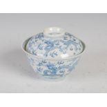A Chinese porcelain blue and white bowl and cover, six character Yongzheng mark but later, decorated