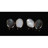 ORLAP STUDIO, A pair of 9 carat gold, Mother of Pearl and Black Lip Pearl oval cufflinks, Stamped: