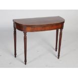 A George III mahogany and boxwood lined demi lune tea table, the hinged top above a plain frieze,