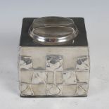 Archibald Knox for Liberty, a Tudric pewter 'Knox box'/ biscuit box and cover, with embossed