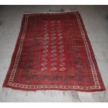 A Tekke rug, late 19th/early 20th century, the rectangular madder ground field decorated with