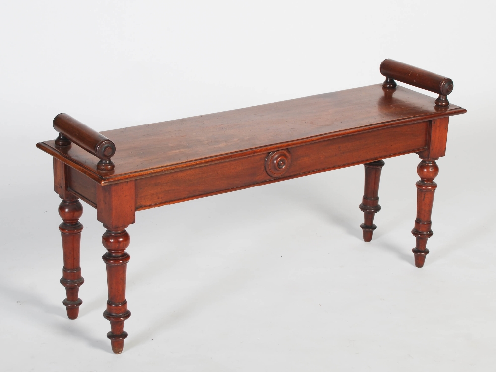 A 19th century mahogany hall bench, the rectangular top with moulded edge and two upright