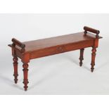 A 19th century mahogany hall bench, the rectangular top with moulded edge and two upright