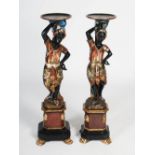 A pair of late 19th century Venetian carved and painted wood ornamental figurative stands, each