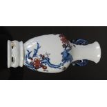 A Chinese porcelain blue, white and copper red wall vase, late 19th/early 20th century, decorated
