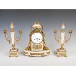 A late 19th century French gilt and white marble clock garniture, the clock with circular convex
