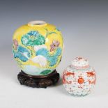 A Chinese porcelain yellow ground jar, Wang Bingrong, Qing Dynasty, decorated in relief with egret