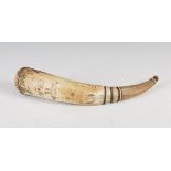 An 18th century scrimshaw powder horn, with finely incised line decoration of two female figures,