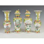 A Chinese porcelain yellow ground garniture of four vases, Qing Dynasty bearing four character