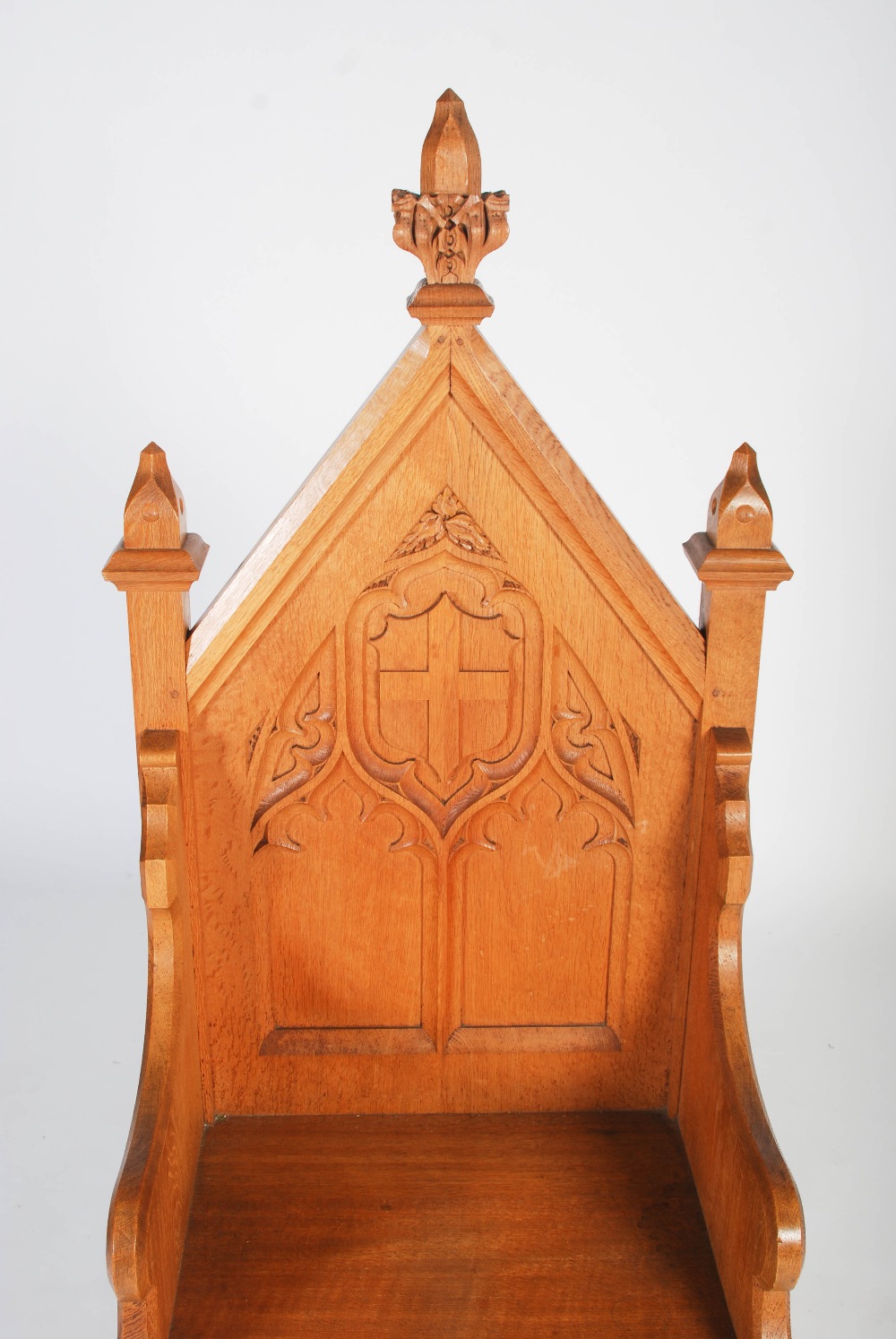 An early 20th century oak Gothic altar chair, the triangular panelled back centred with a relief - Image 3 of 9