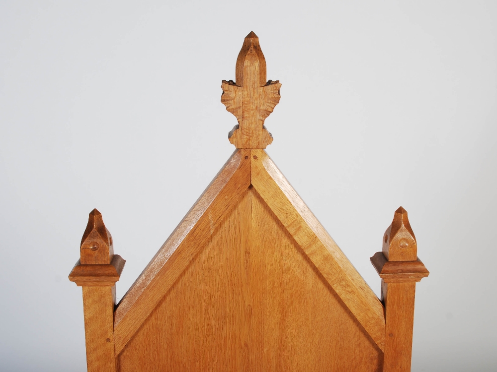 An early 20th century oak Gothic altar chair, the triangular panelled back centred with a relief - Image 9 of 9