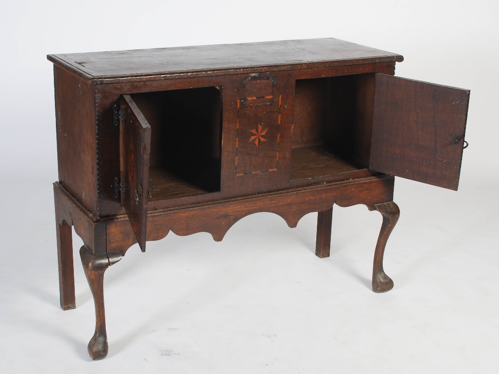 An Arts & Crafts oak and marquetry inlaid cabinet on stand, the cabinet section with rectangular top - Image 6 of 10
