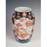 A Japanese Imari porcelain vase, late 19th/early 20th century, decorated with two rectangular shaped