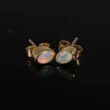 PRISM DESIGN, A pair of 9 carat yellow gold and oval opal earrings, Stamped: PD, 375.