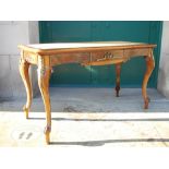 A 19th century rosewood and gilt metal mounted bureau plat, the shaped rectangular top with a velvet