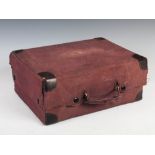An early 20th century purple leather simulated crocodile skin vanity case, with silver mounted