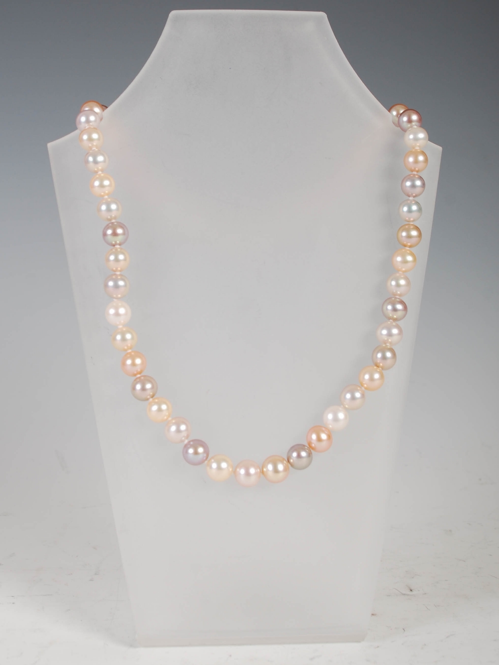 A cultured pearl necklace, with fifty three slightly off round high lustre pearls in various