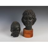 AR Avril J.D. Gilmore (fl.1957-1983) Two cold painted bronzed terracotta sculpted busts, one