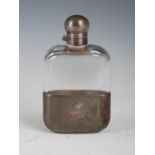 An Edwardian silver and clear glass spirits flask, Sheffield 1902, makers mark of JCV, the silver