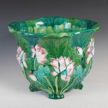 A 19th century Minton Majolica pottery jardiniere dated 1863, modelled in relief with lotus