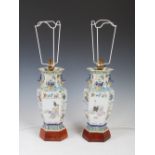 A pair of Chinese porcelain famille rose hexagonal shaped vases later mounted as table lamps, Qing