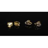 Two pairs of 9 carat gold earrings, comprising: a pair of 9 carat gold overlapping leaf earrings,