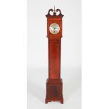 An early 20th century mahogany Grandmother clock, the silvered dial with Arabic numerals, the