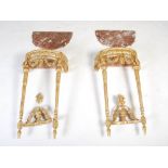 A pair of Neo Classical style gilt wood console tables, the demi lune red and white marble tops