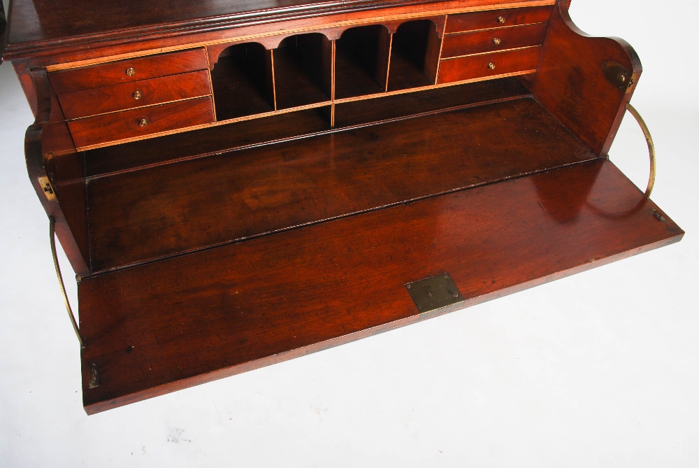 A George III mahogany and boxwood lined secretaire bookcase, the arched cornice centred with a - Image 8 of 9