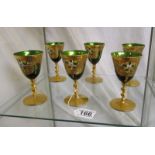 Set of six green Venetian glasses