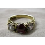 Gold cabochon garnet 3 stone ring